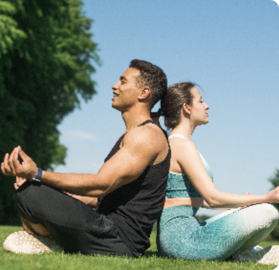 two people sitting back to back